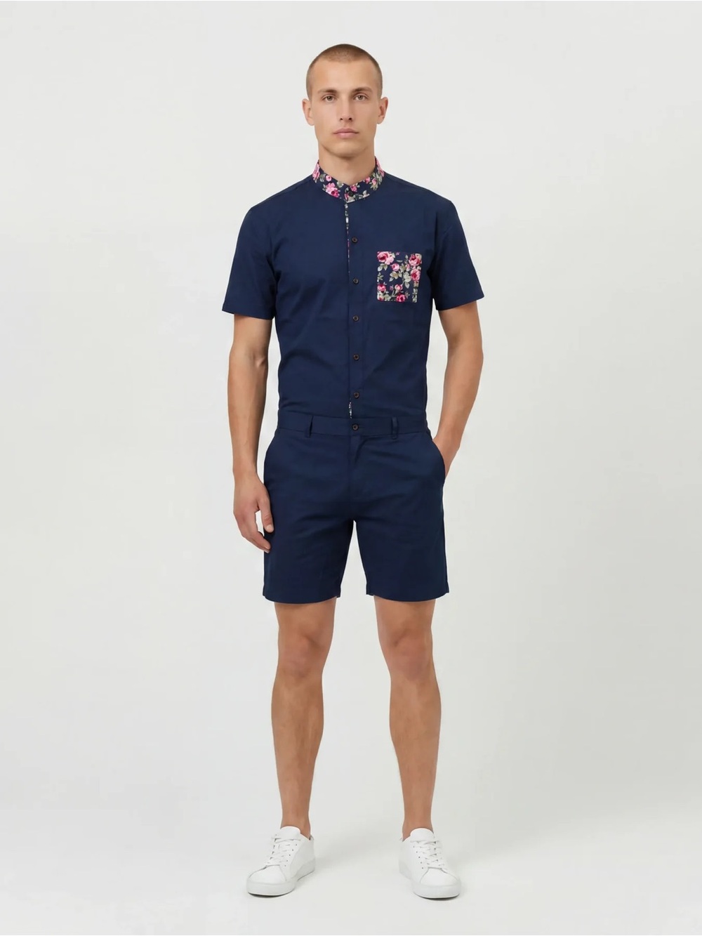 Navy Short-Sleeve Romper with Floral Detailing